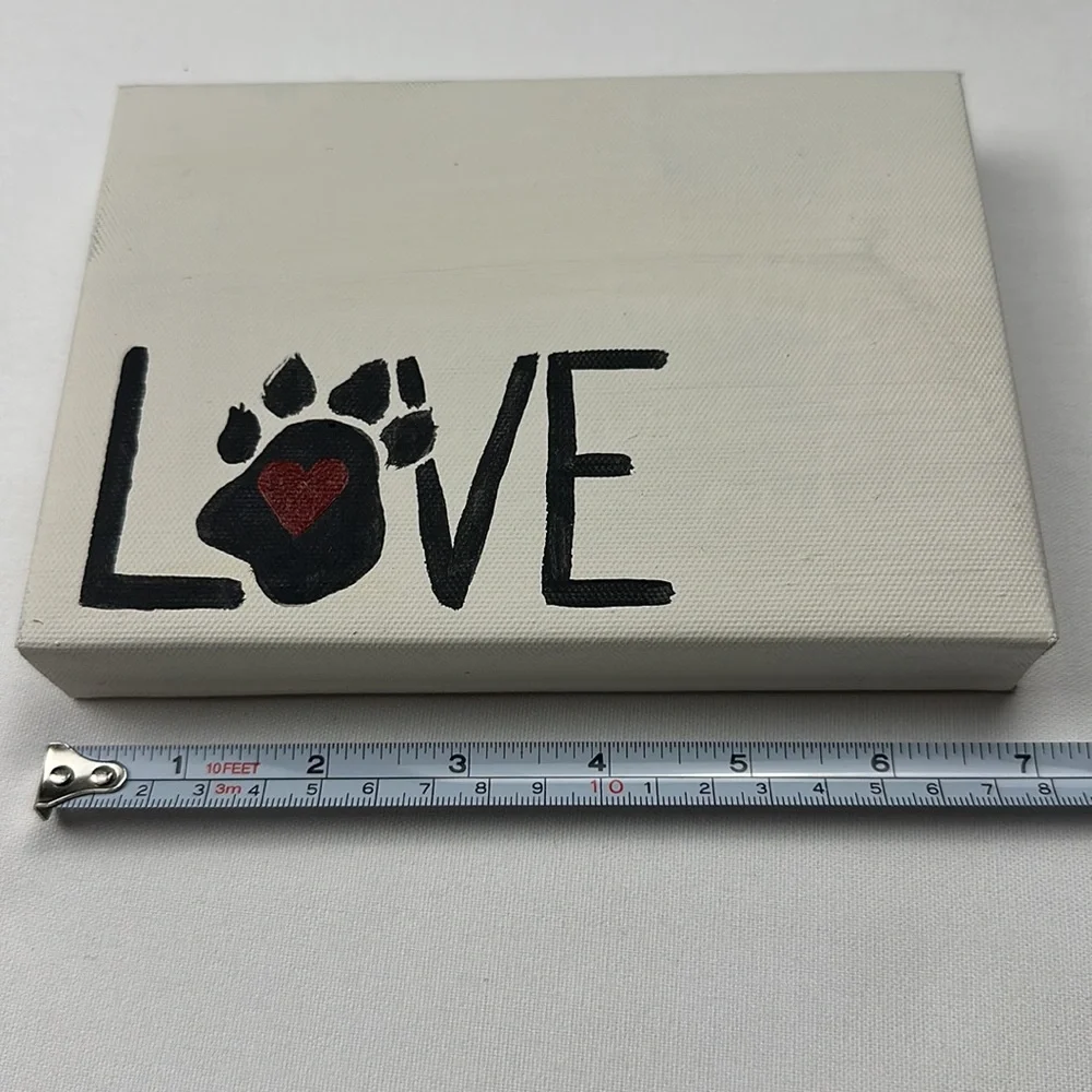 Hand crafted (painted) wall art decor. “Love” with a puppy paw and heart.